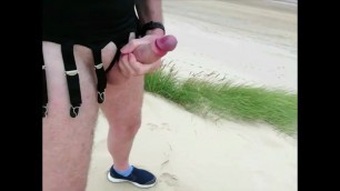 Cock out and wanking on the beach, with cum